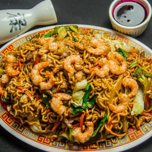 Wok-tossed egg noodles loaded with juicy prawns, fresh vegetables, and a savory soy-based sauce.